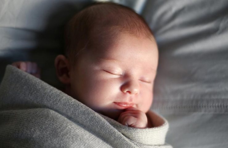 A new born baby girl sleeping