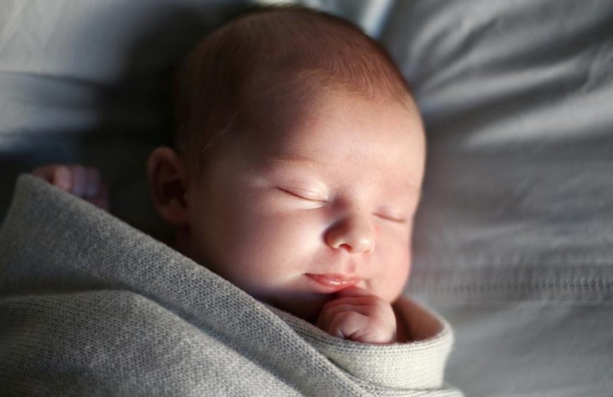 A new born baby girl sleeping